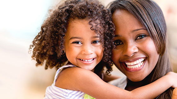 guaranteed-lice-treatment Smiling mom and daughter since they're lice free